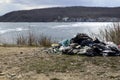 A pile of garbage left on the shore of the Sea of Ã¢â¬â¹Ã¢â¬â¹Japan after people rest. environmental pollution concept Royalty Free Stock Photo